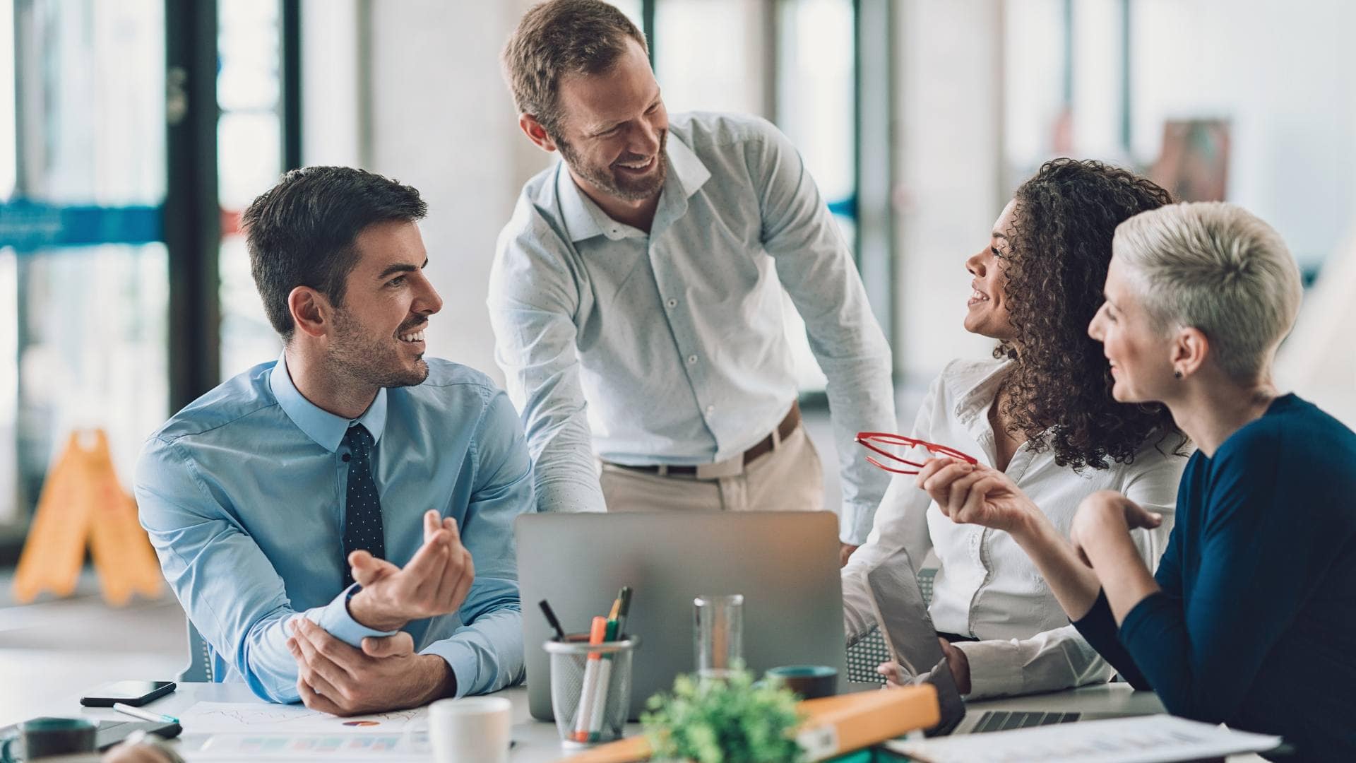 Professional marketers at one of the top lead generation companies working together to drive revenue through digital strategy.